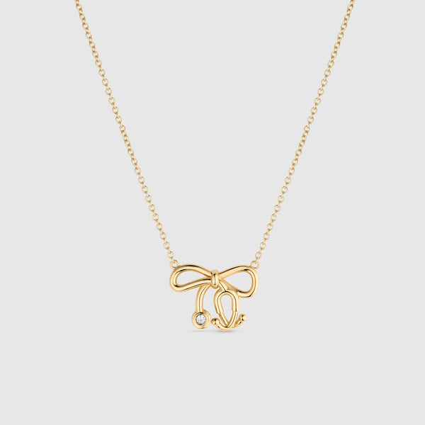 Gold Stethoscope Bow Necklace
