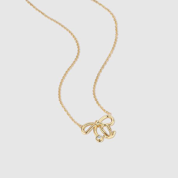 Gold Stethoscope Bow Necklace